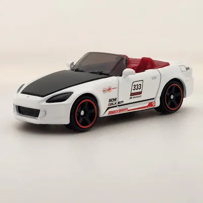 2026 Matchbox Moving Parts No. 06/50 is the 2004 Honda S2000. White with a black bonnet and a racing livery on both side