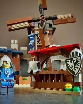 LEGO 31120 Medieval Castle — the 3rd build turns this set into a medieval village.Windmill, market stall, training area…