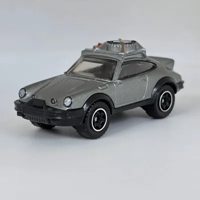 2026 Matchbox No. 73/125 is the 1985 Porsche 911 Rally.This version is superb. Metalflake silver with a black interior a
