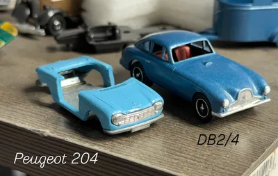 Scenes from the workbench...Majorette Peugeot 204 cabrioletLesney Matchbox Aston Martin DB2/4 mk.2Corgi Whizzwheels Aust