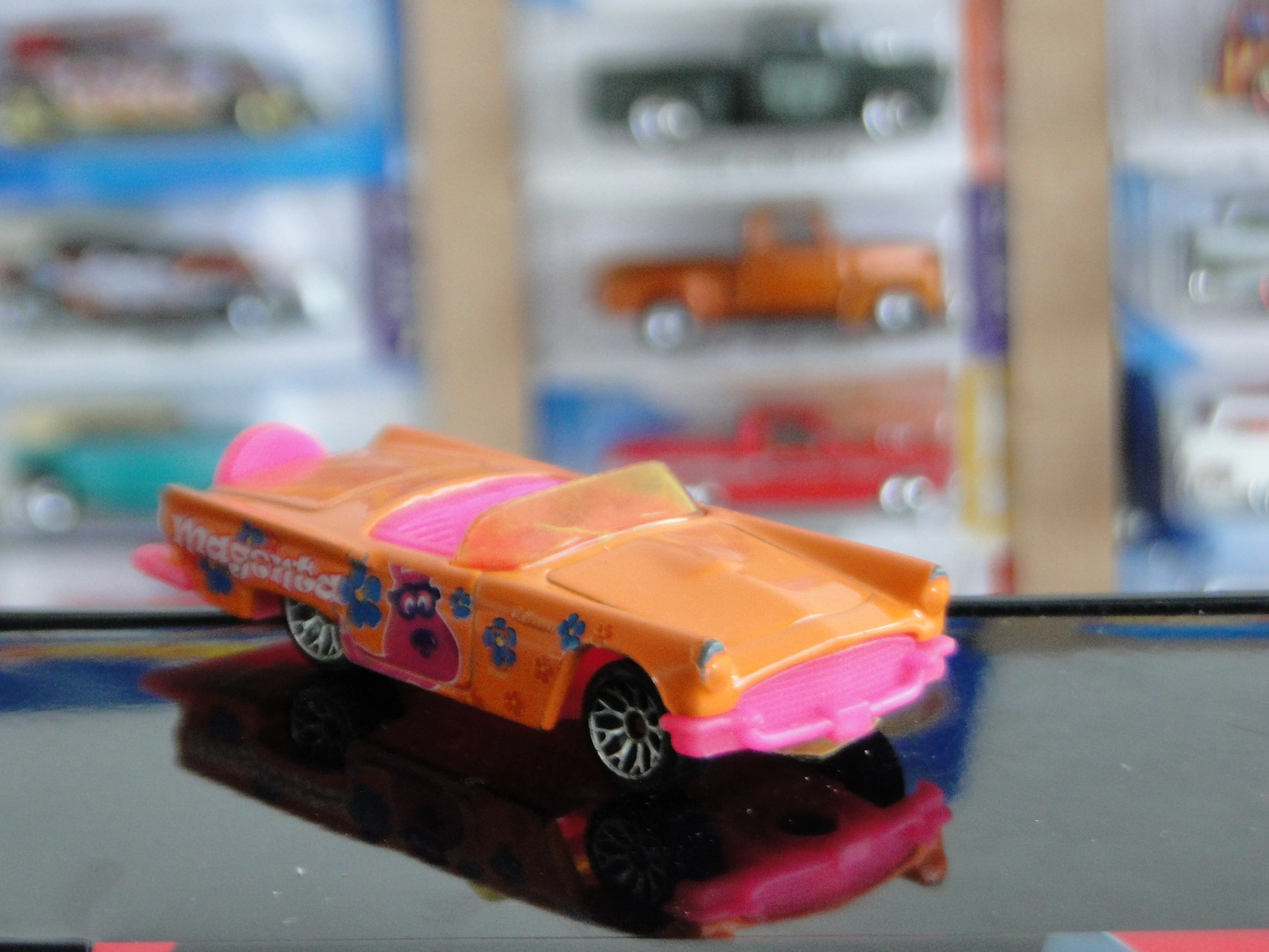 1957 Thunderbird (Orange, Magenta (character and text))