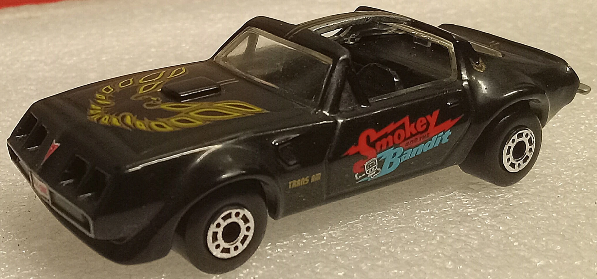 Pontiac Firebird T-Roof (Black, Eagle, TRANS AM tampos, Smokey and the B…)