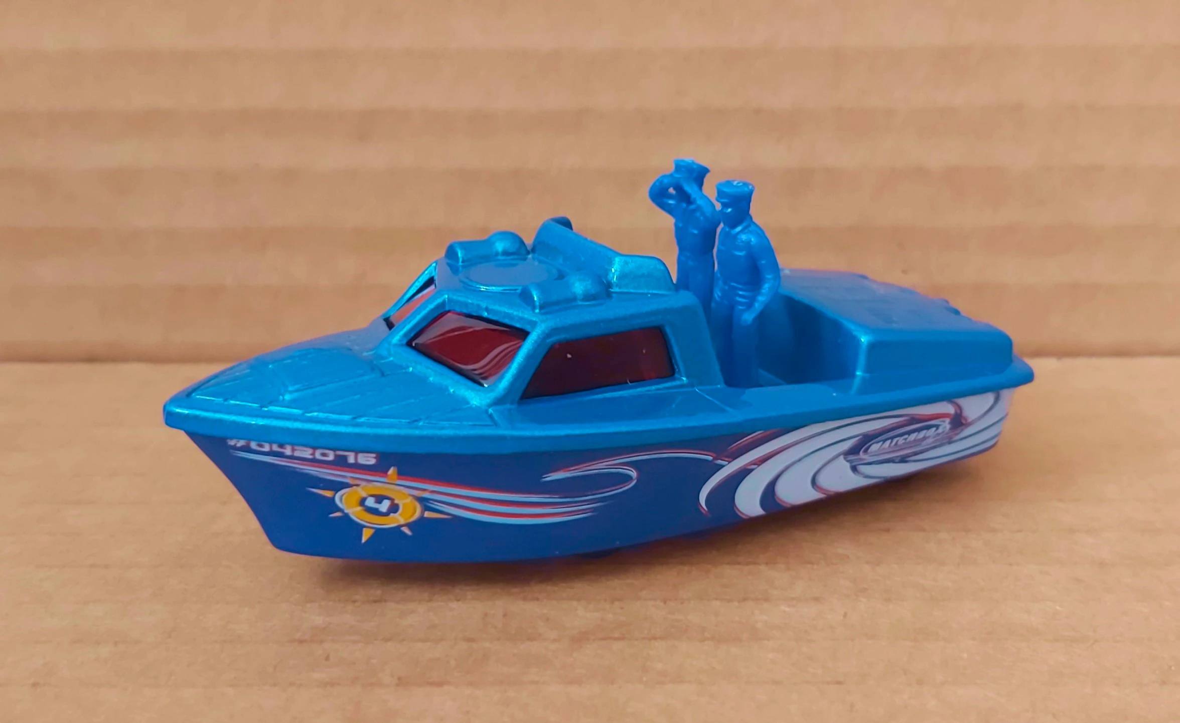 Police Launch (Blue, Red/white waves and swirl, yellow compas…)