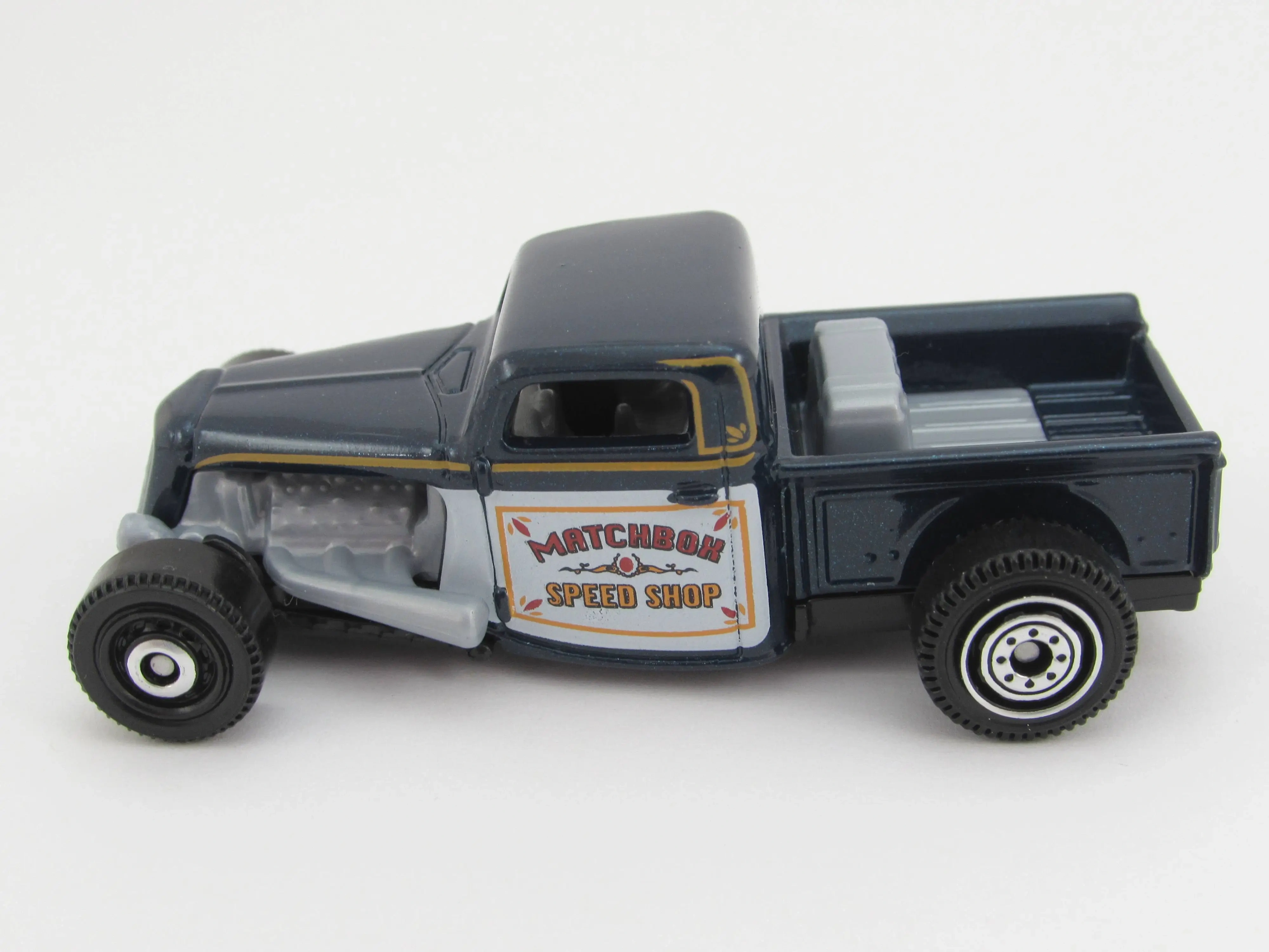 1935 Ford (Dark Blue, Matchbox Speed Shop and gold striping on…)