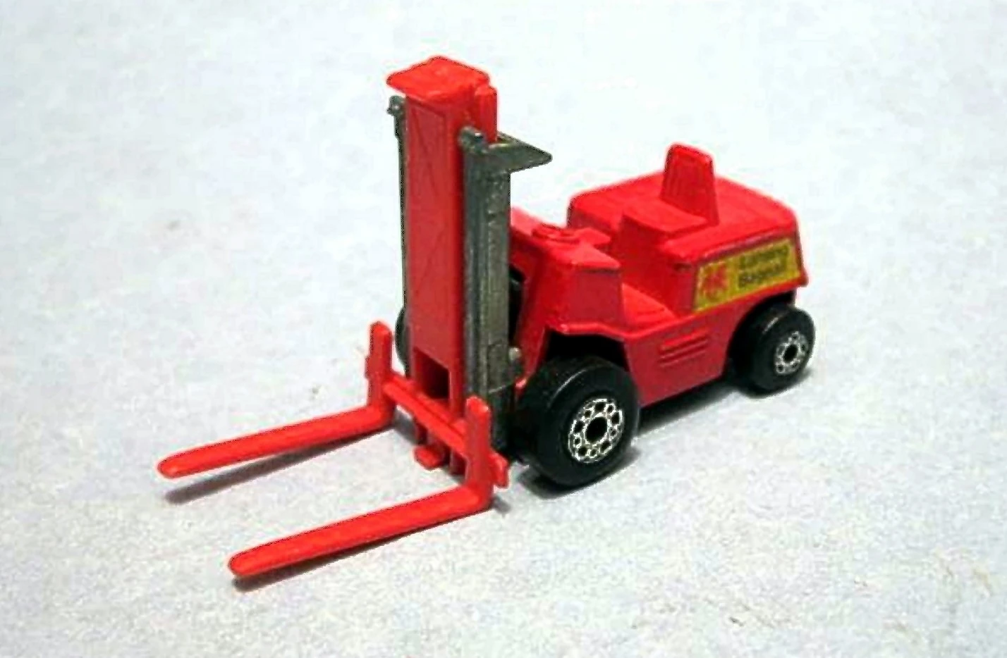 Fork Lift Truck (Red w/ Unpainted lift bars and orange forks, Yellow, Red, Black "Lansing Bagnall" sti…)