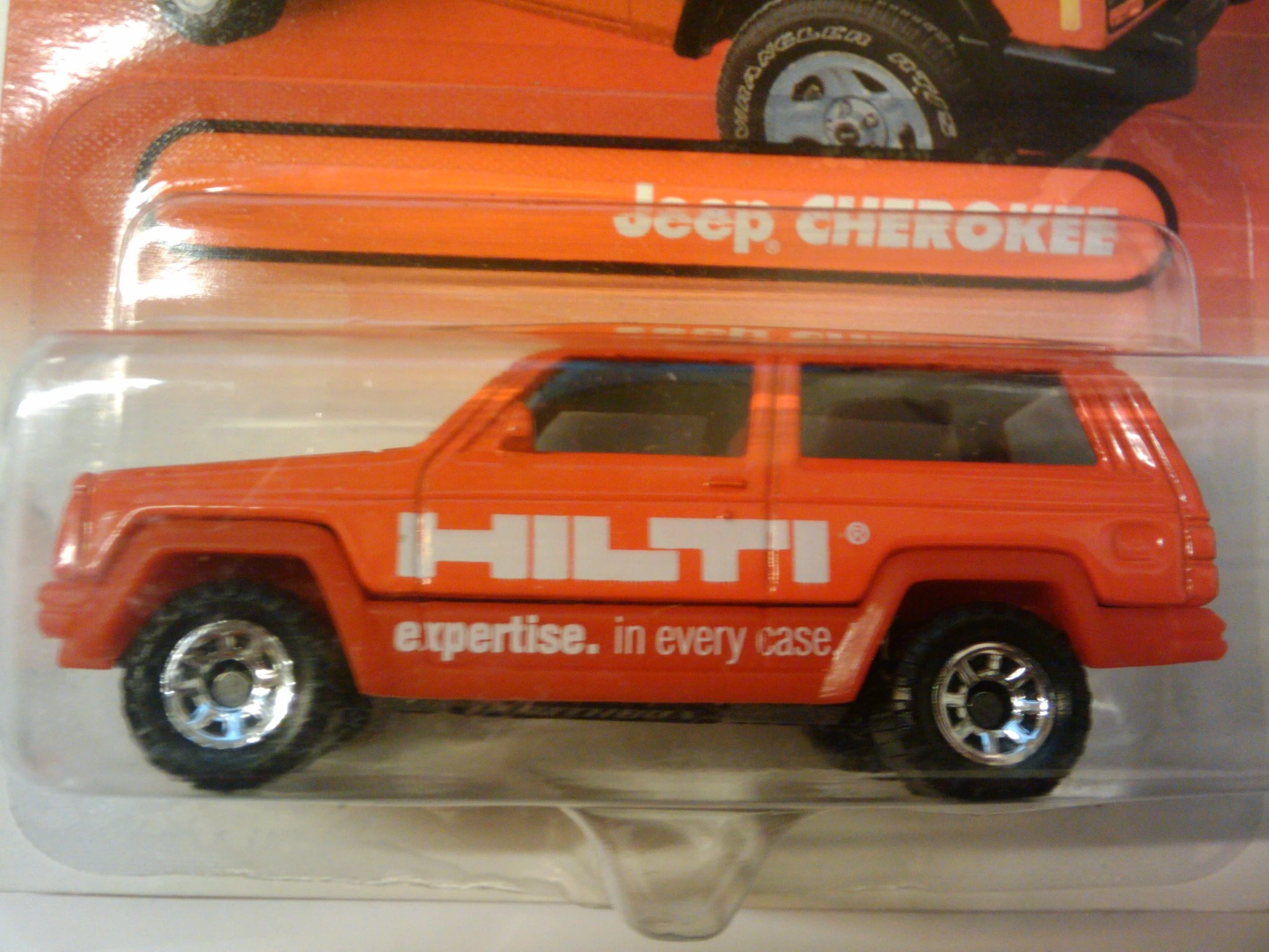 Jeep Cherokee (Red, HILTI, expertise. in every case.)