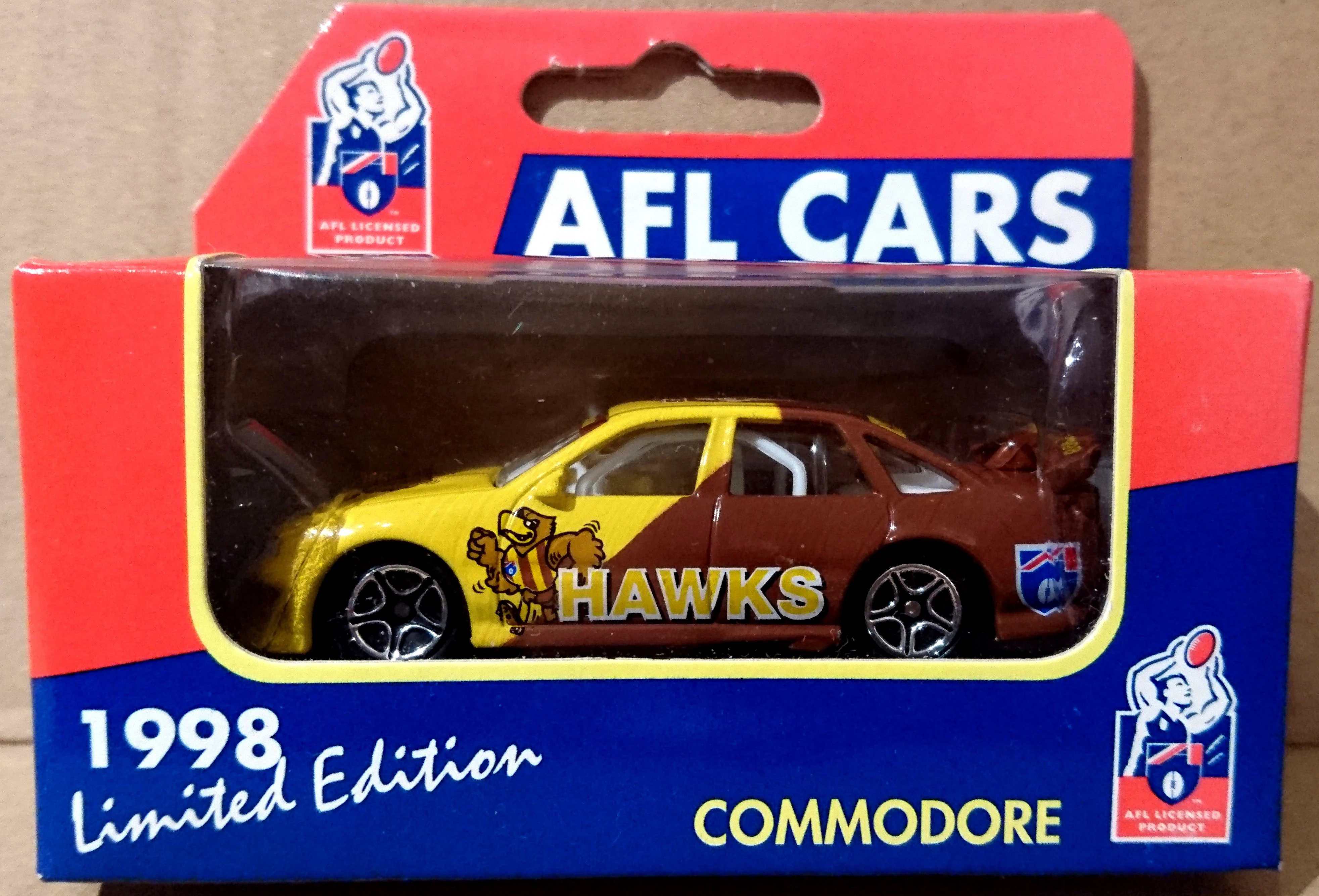 Holden Commodore (Yellow & Brown, Hawthorn Hawks)