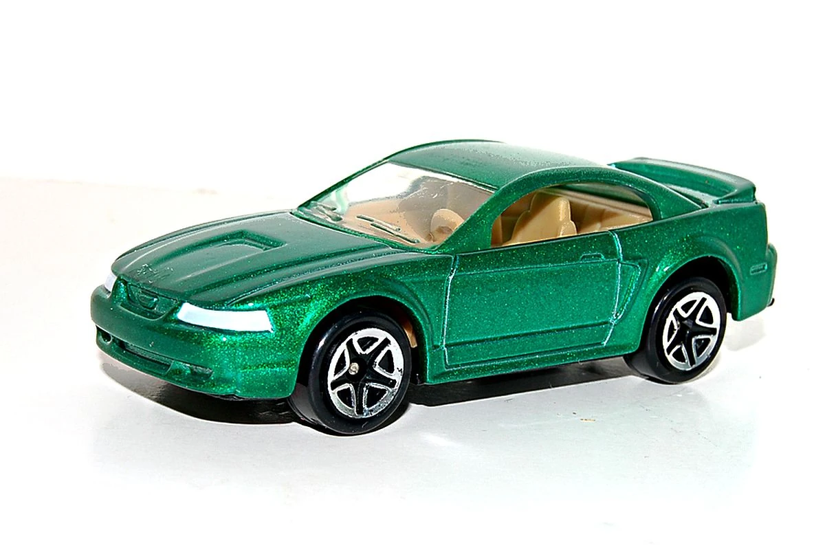 99 Ford Mustang GT (Metallic Emerald Green, White headlights, Red taillights and 3rd…)