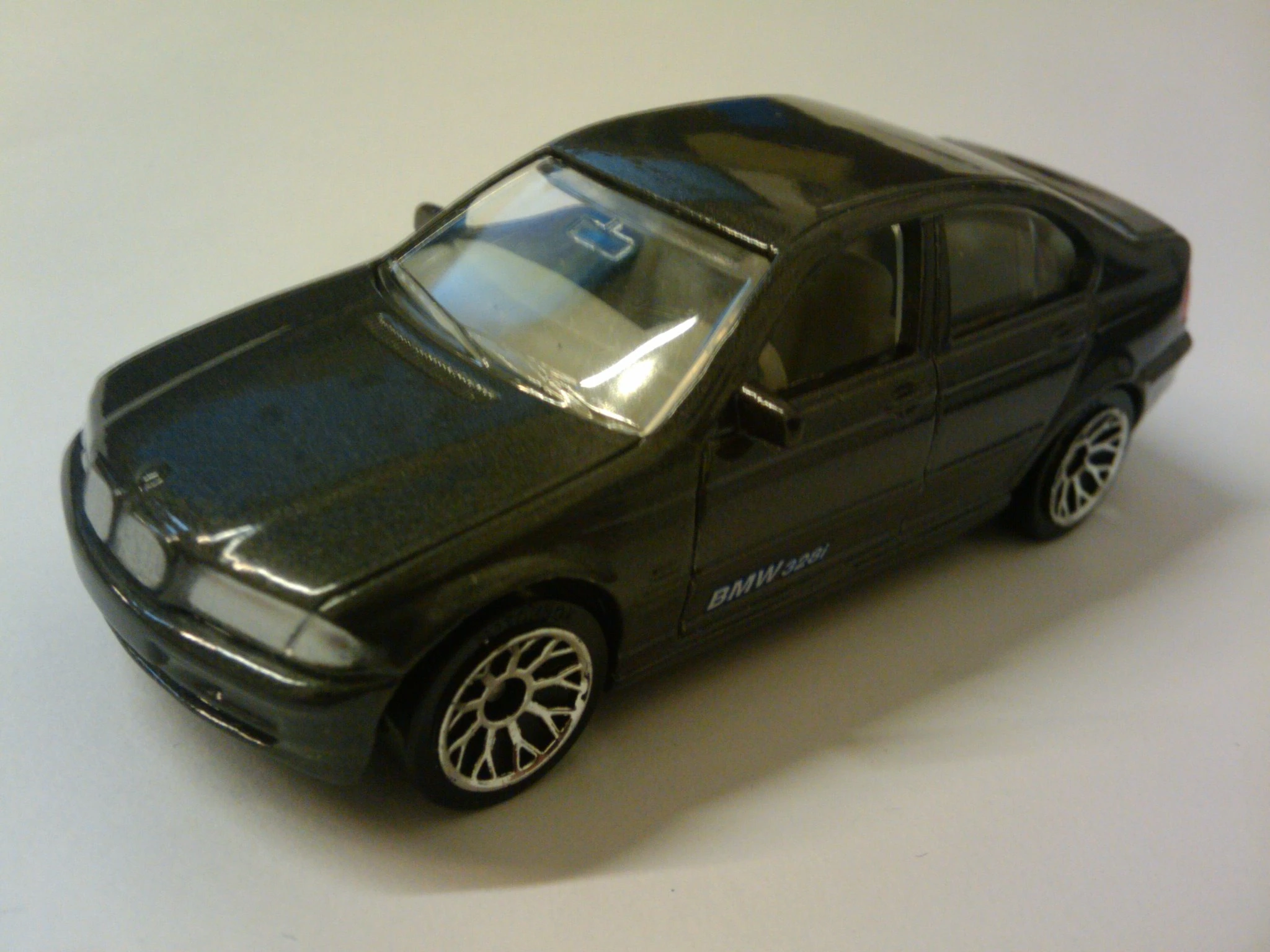 BMW 328i (Metalflake Dark Gray, BMW 328i on door, Silver headlights, Red…)