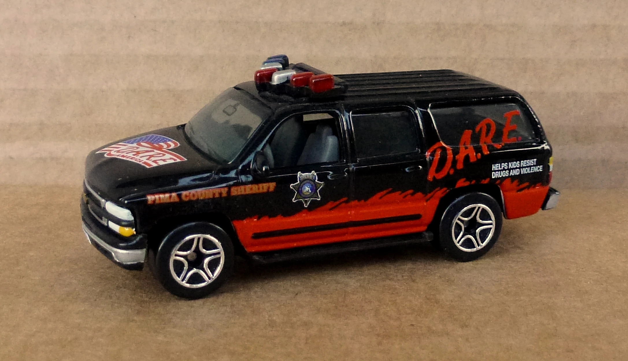 2000 Chevrolet Suburban (Black, jagged red band, flag, D.A.R.E. America,…)