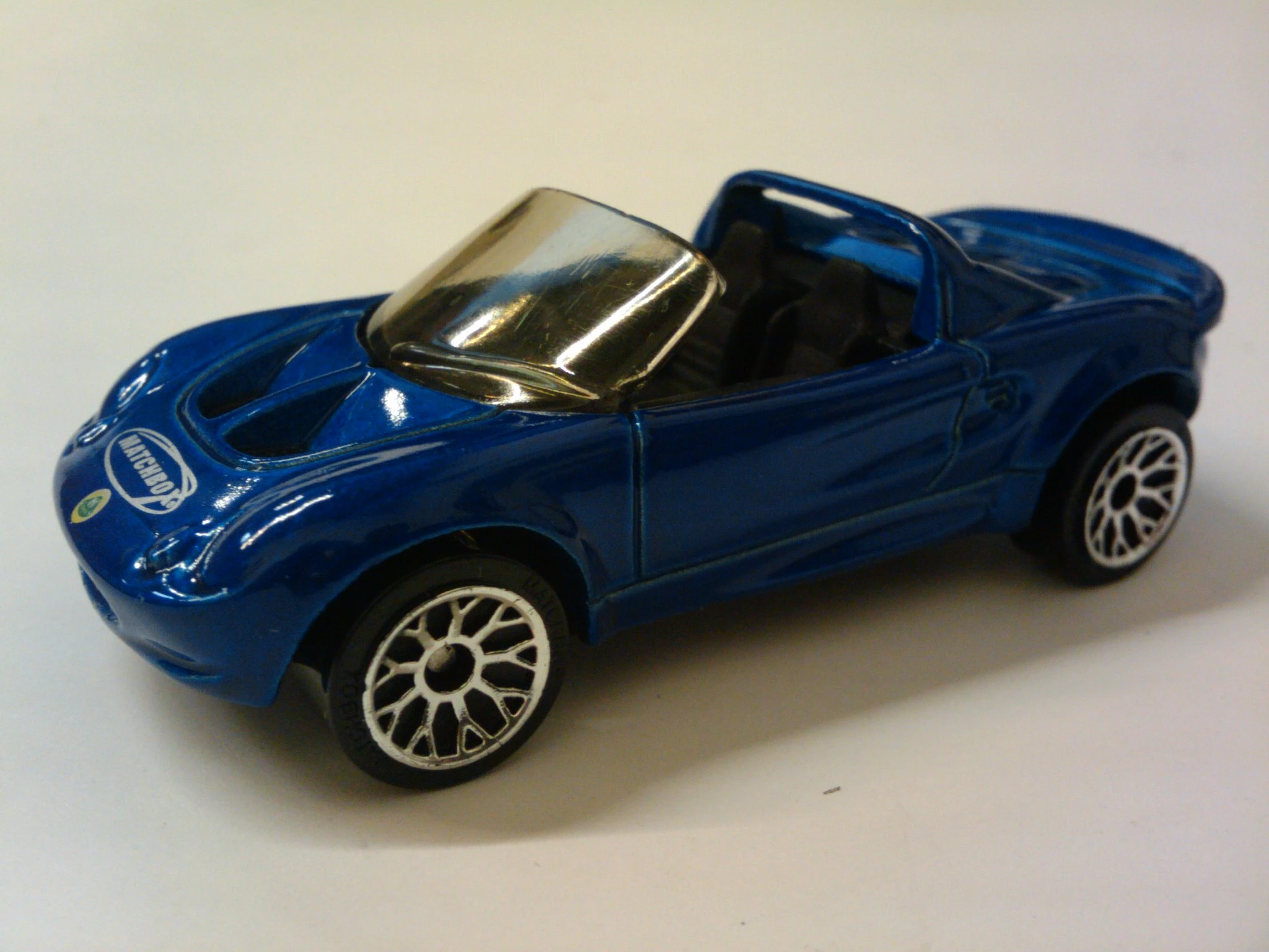 Lotus Elise (Deep Blue, Lotus Badge on hood, White Matchbox logo…)
