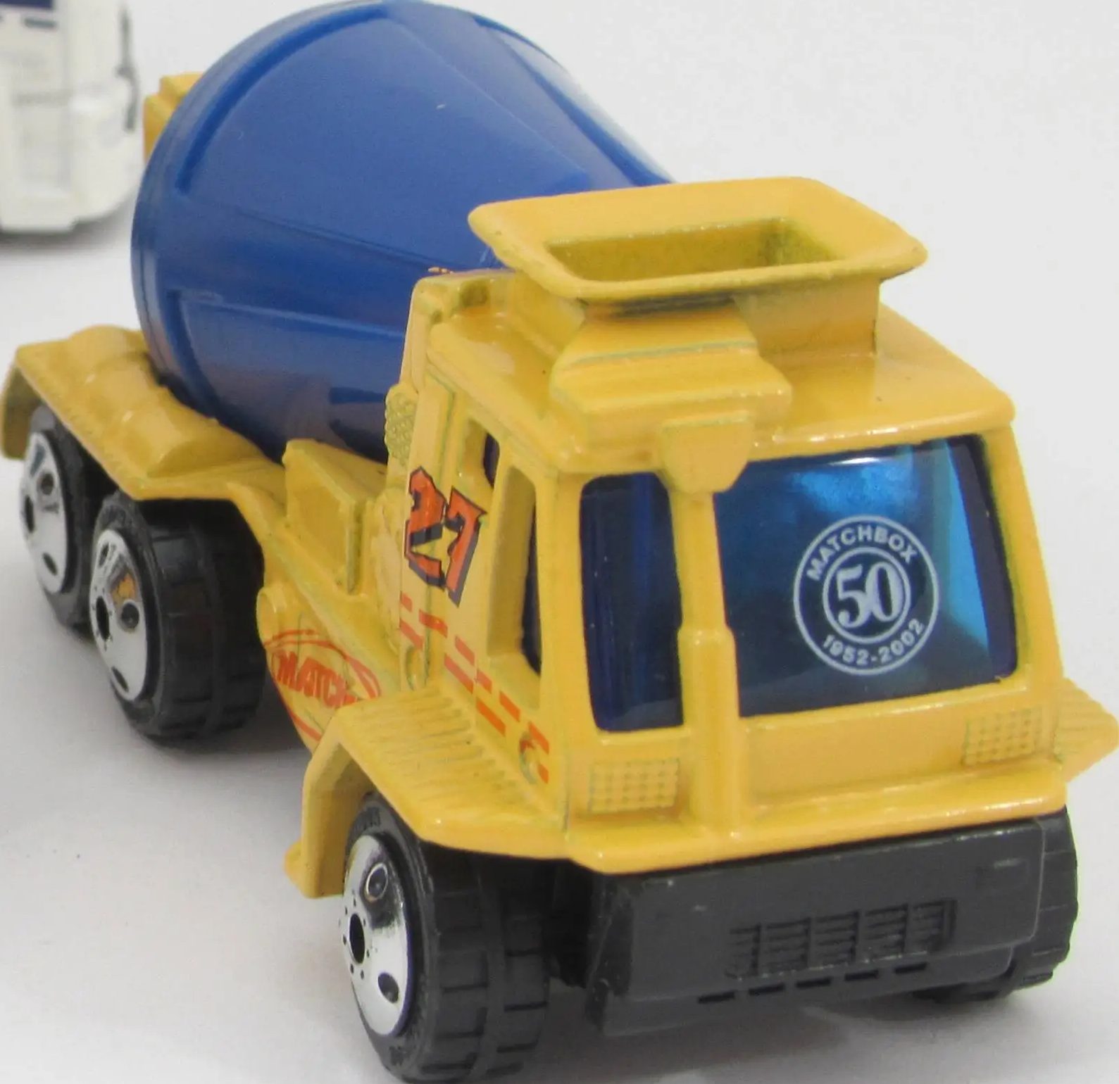Cement Mixer (Yellow, 27, Orange stripes, Matchbox, '50' logo…)