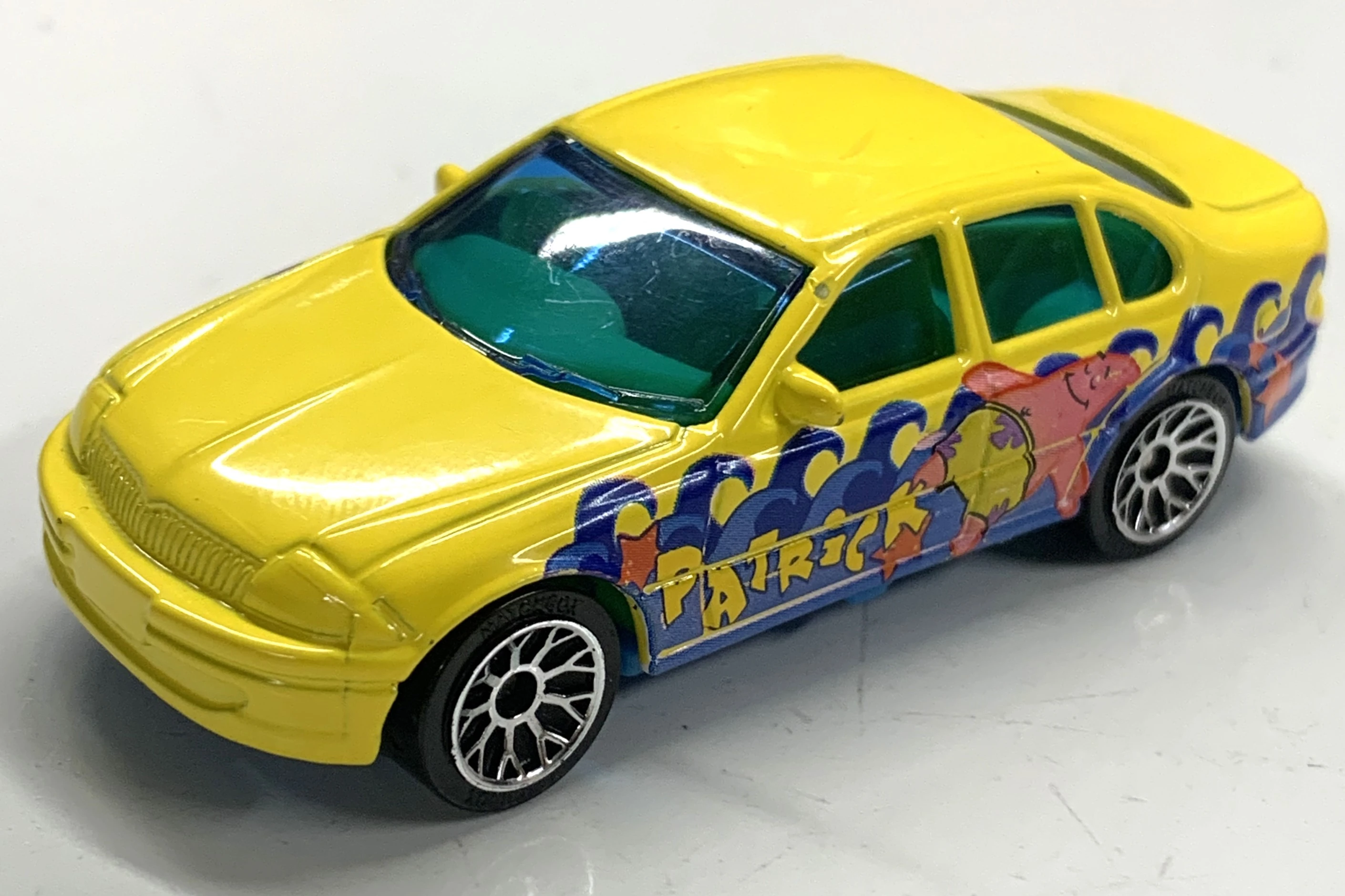 Ford Falcon Forte (Yellow, Waves, Patrick (text and character))