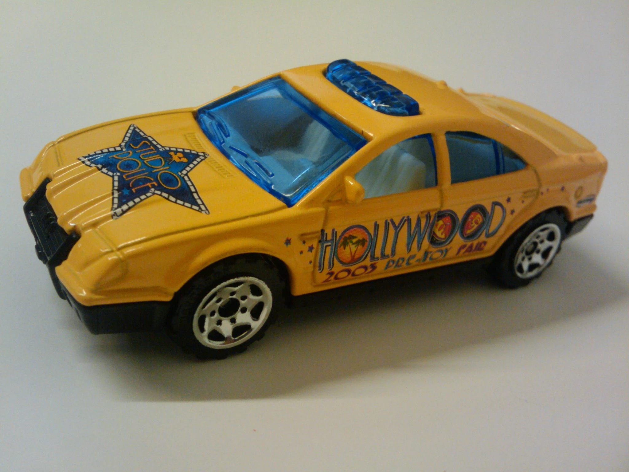 Police Car (Yellow, HOLLYWOOD, 2003 Pre-Toy Fair on side, St…)