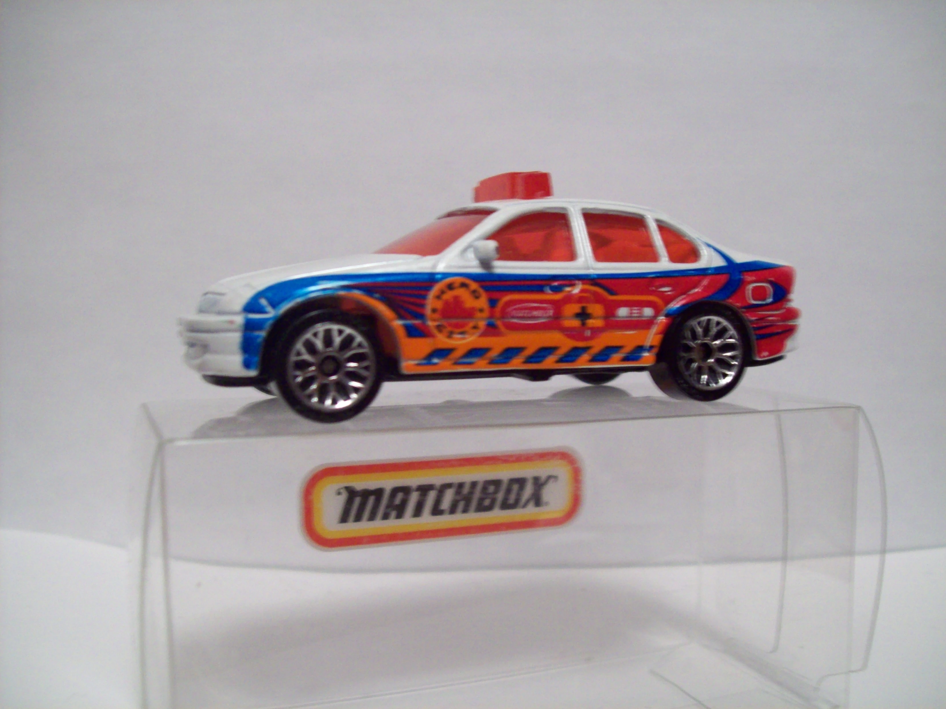 Ford Falcon Police (Pearl white, Orange red, dark blue streaks. Blue caut…)