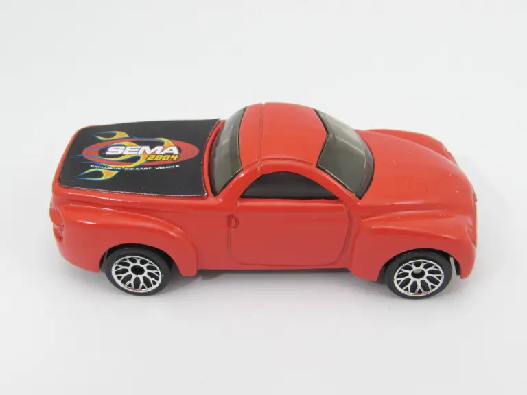 Chevrolet SSR (Red-Orange, None, except for a thick SEMA sticker)