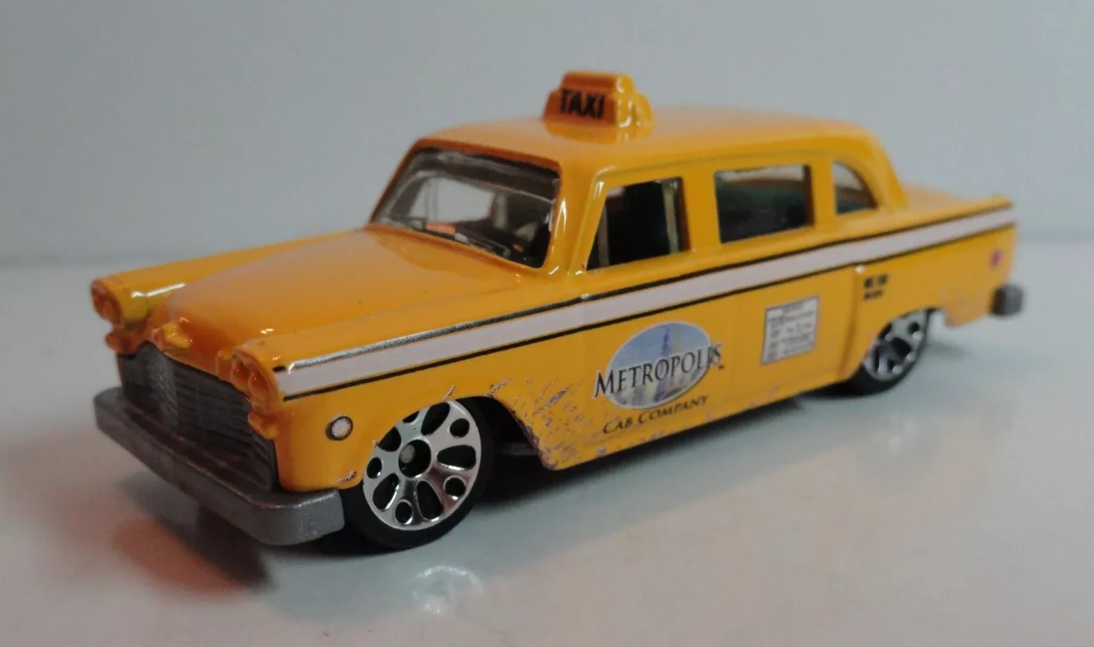 Checker Cab (Yellow, Metropolis Cab Company, White stripe, mu…)