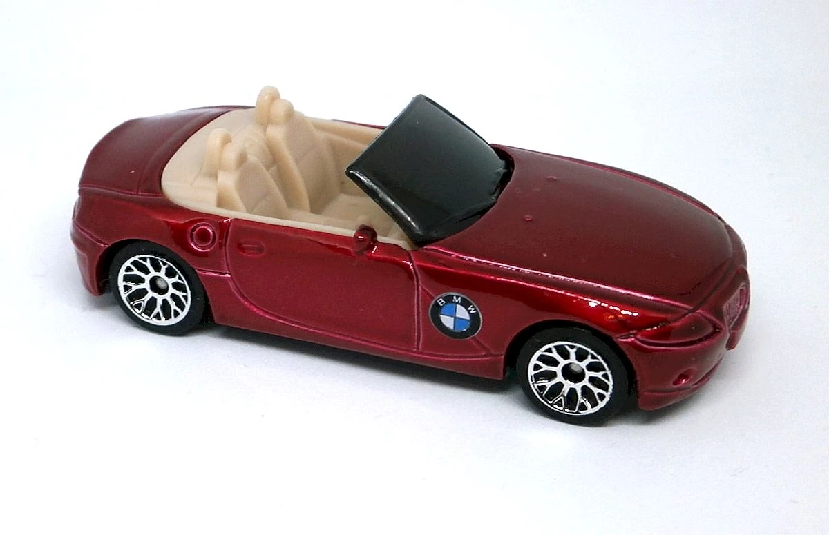 BMW Z4 (Metalflake Red, Large BMW badge on fender)