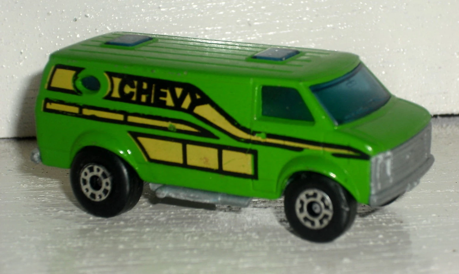 Chevy Van (1979) (Green, "Chevy" with Brown or Lemon stripes)