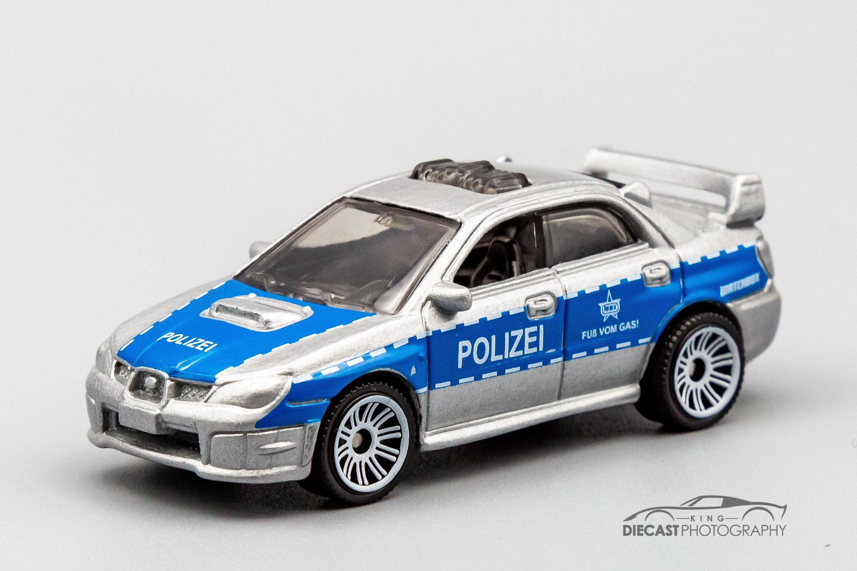 Subaru Impreza Police (Silver, Blue stripe, "Polizei" on doors and hood)