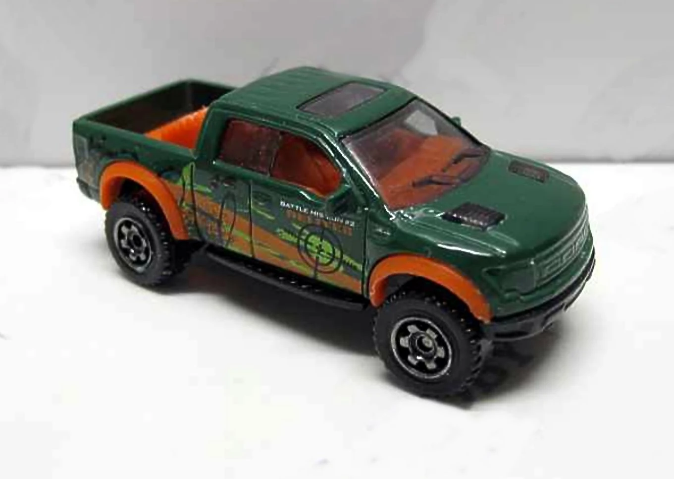 Ford F-150 SVT Raptor (2010) (Dark Green, Orange stripes, BATTLE MISSION 2)