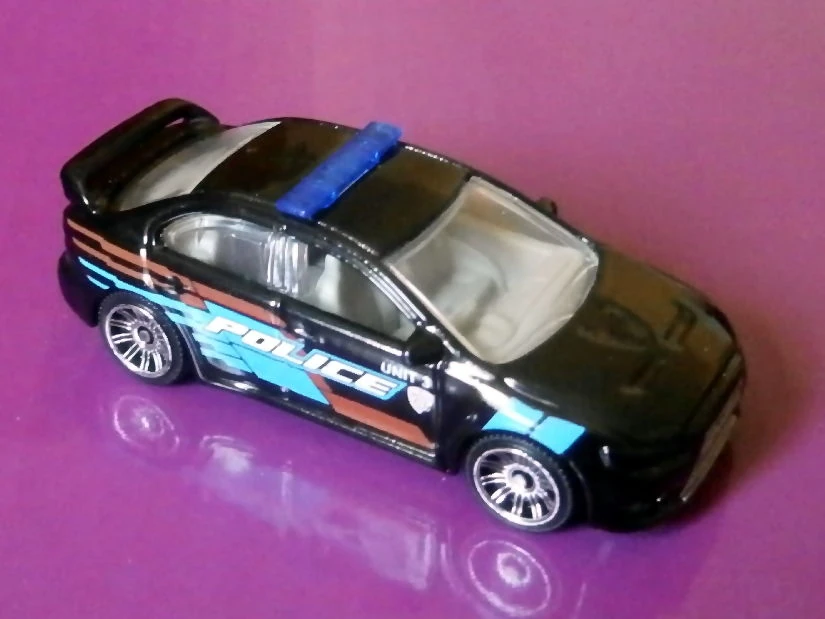 Mitsubishi Lancer Evolution X Police (2010) (Black, Light Blue and Red graphics on sides, Po…)