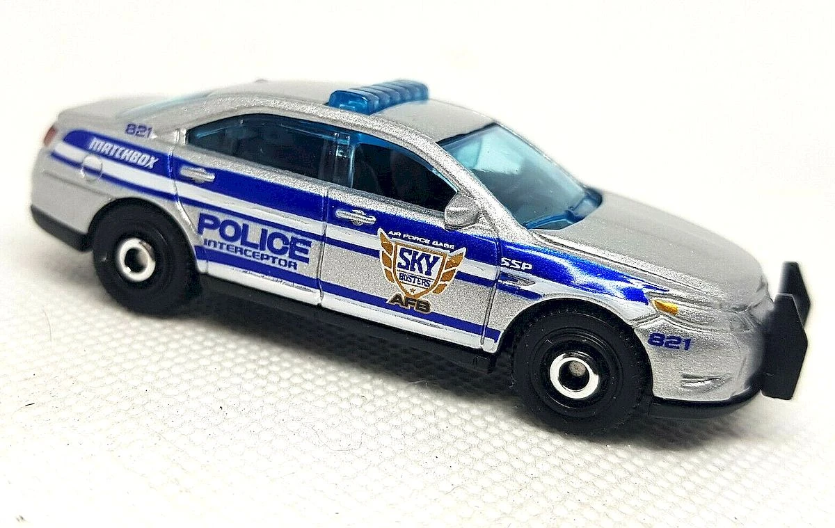 Ford Police Interceptor (Silver, Blue stripes, POLICE, SKY BUSTERS)