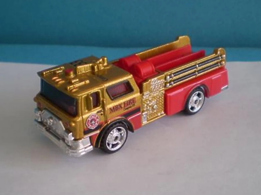 1975 Mack CF Pumper (Metalflake Gold / Red, MBX FIRE)