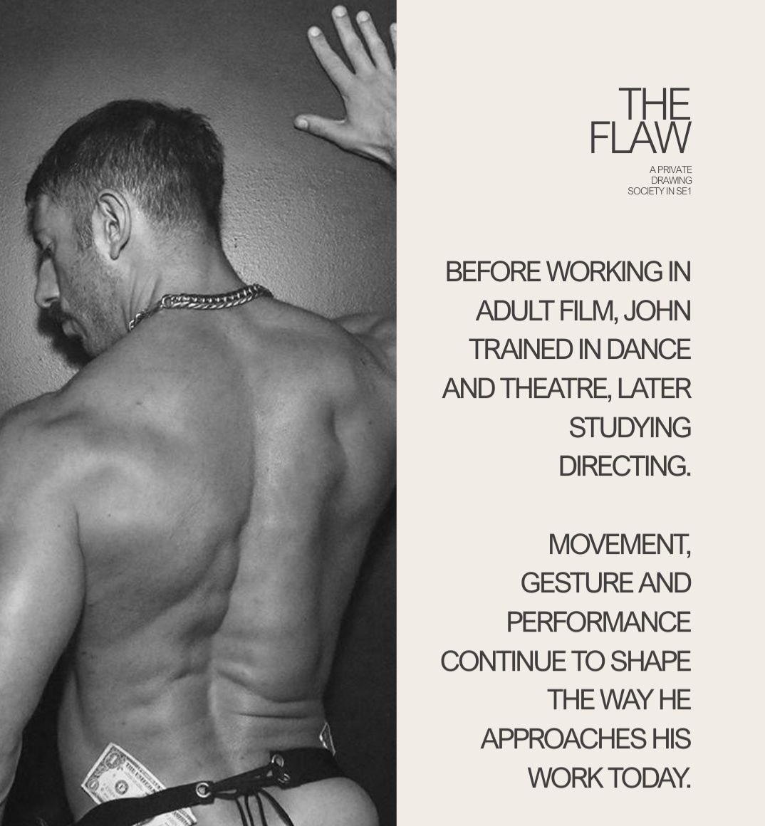 A black and white artistic photograph of a muscular man from behind, showing his back muscles. He has a chain around his neck and money tucked into his waistband.