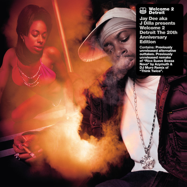 The album cover for Jay Dee aka J Dilla's "Welcome 2 Detroit" 20th Anniversary Edition. The image features a man smoking with a woman in the background.