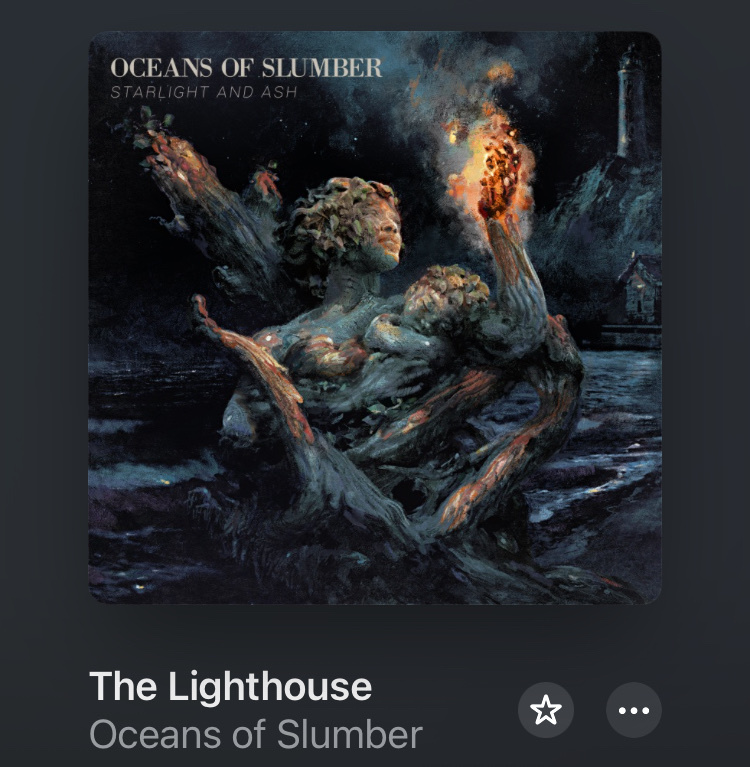 The album art for 'Starlight and Ash' by Oceans of Slumber features a dark, surreal painting of figures emerging from stormy waters, with a lighthouse in the background. A figure holds a ball of fire, illuminating the dramatic scene.