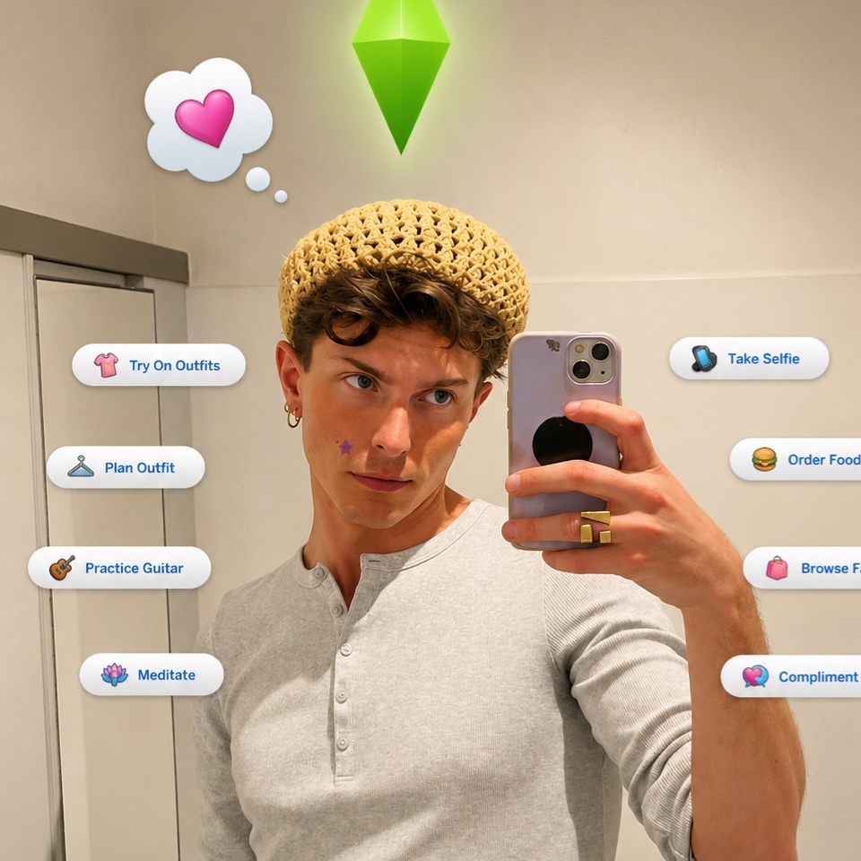 A young man takes a selfie in a mirror, wearing a beige crocheted beanie and a light grey long-sleeved shirt. The image is overlaid with graphics and text bubbles reminiscent of the video game The Sims, suggesting a playful and humorous theme.