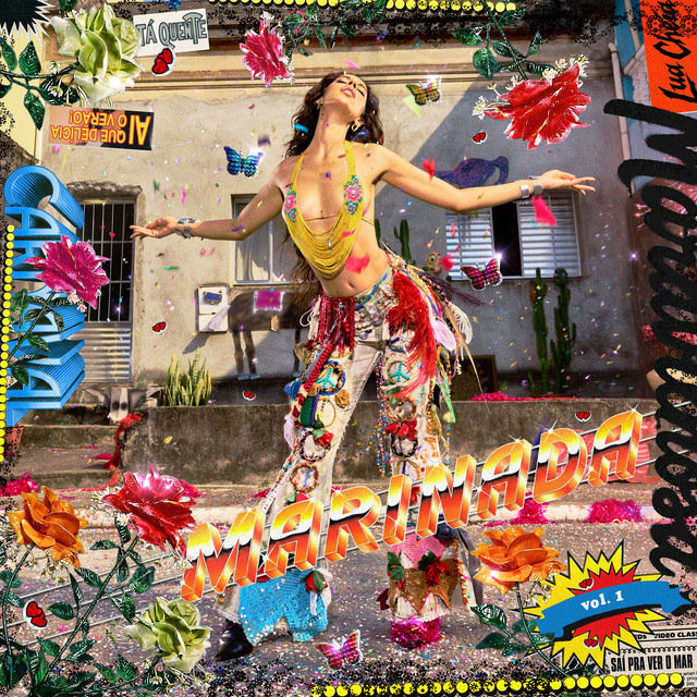 A woman poses in a colorful outfit with floral and butterfly accents. The image has a vibrant, artistic style, likely an album cover.