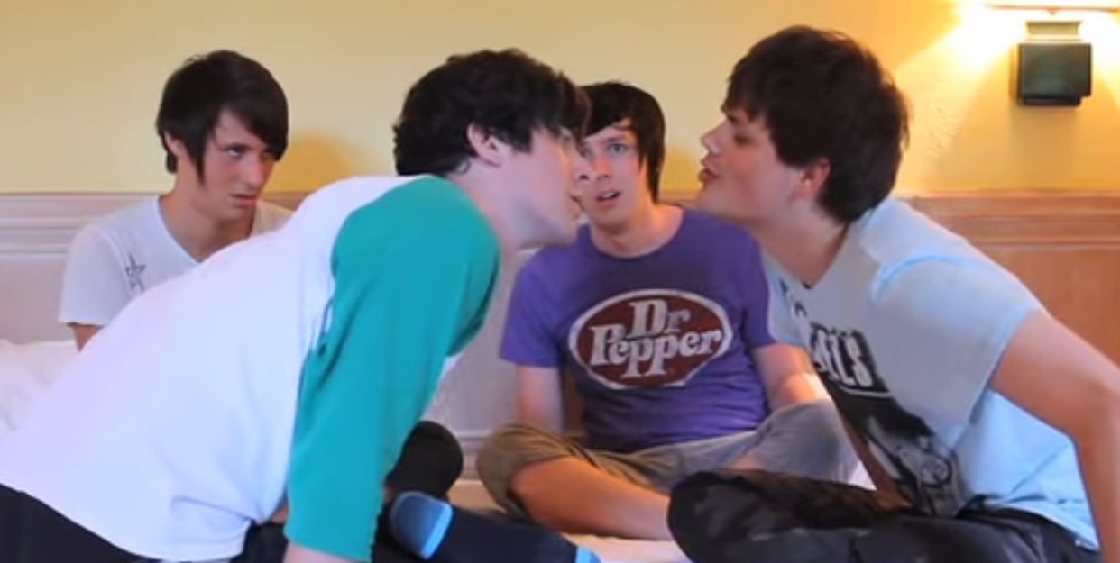 A meme featuring a group of men in a bedroom. The image has text overlay.