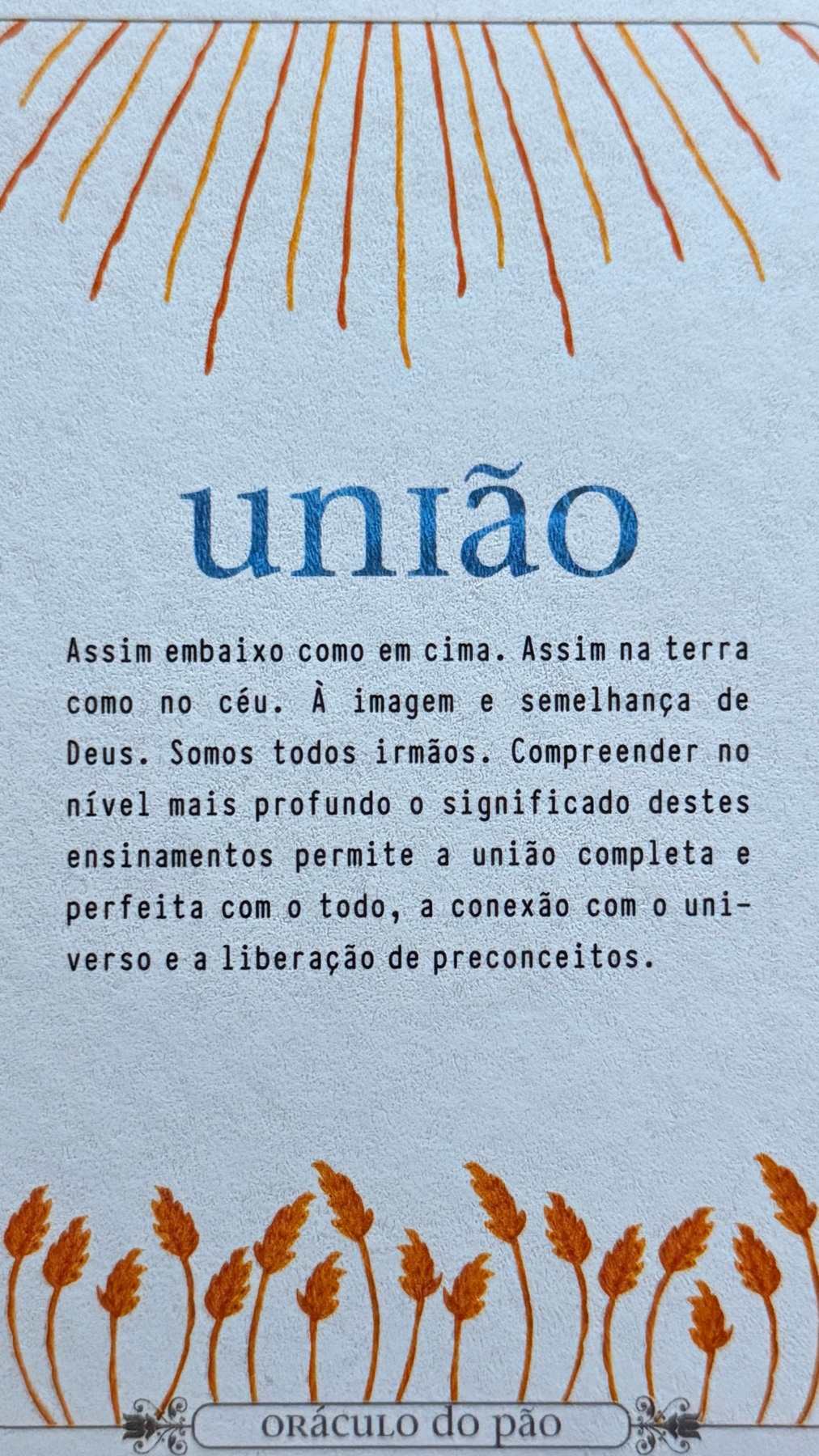A spiritual text with the word 'uniao' at the top, surrounded by sun rays. The text below discusses unity and divine likeness, with a decorative border of wheat stalks at the bottom.