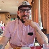 Travis J. Breit