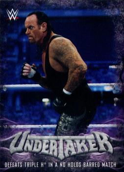 Undertaker - Defeats Triple H in a No Holds Barred Match