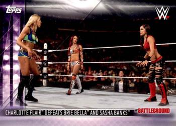 Charlotte Flair Defeats Brie Bella and Sasha Banks
