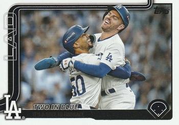 Two in Blue: It’s a Race to Embrace