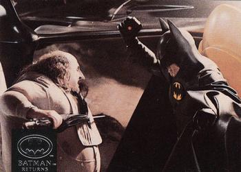 Batman (Michael Keaton) confronts bloated, fr 