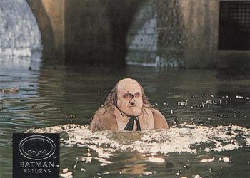 Director Tim Burton prepares Danny DeVito (Th 