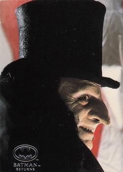 Director Tim Burton guides Danny DeVito (The 