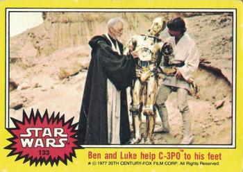 Ben and Luke help C-3PO to his feet 