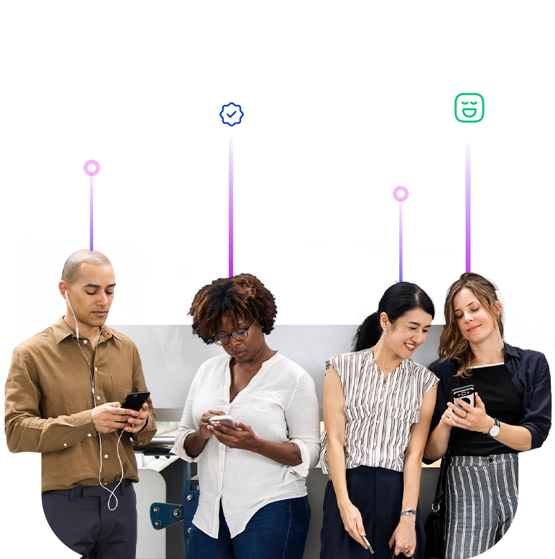 a group of people looking at their phones