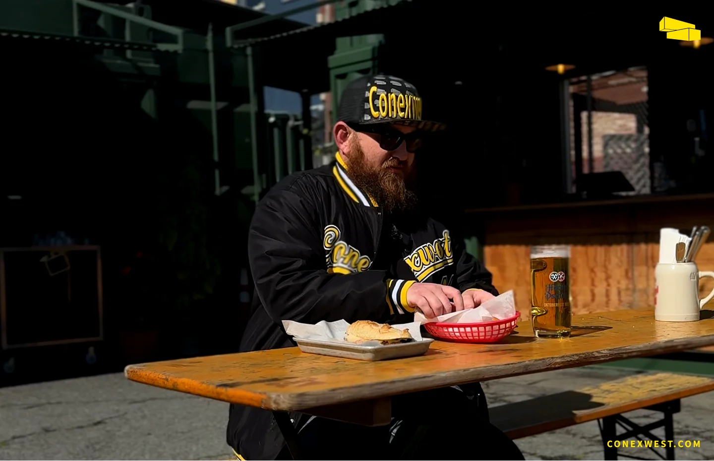 Conex Mike eating traditional German food outside the container kitchen