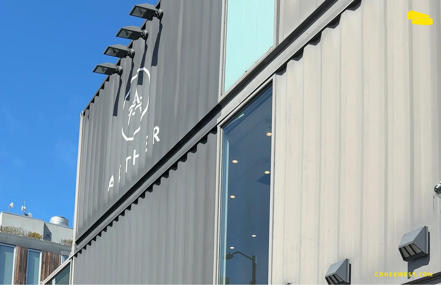 AETHER Apparel shipping container store stacked container design