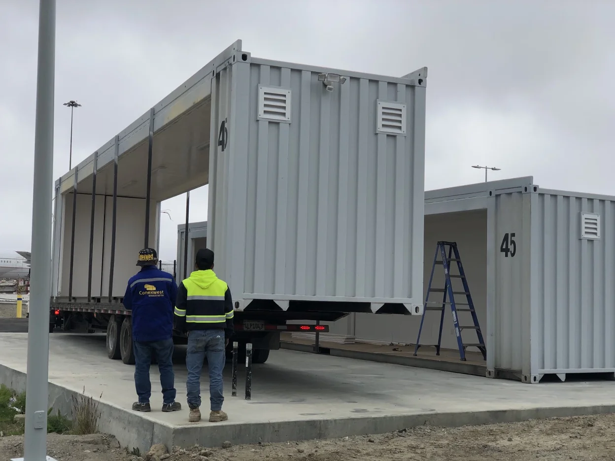 A container being loaded for delivery