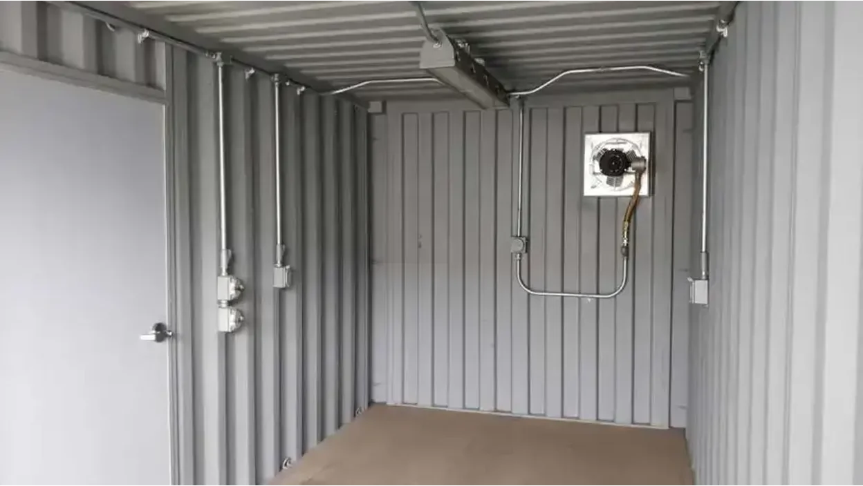 Electrical package installed inside a modified shipping container