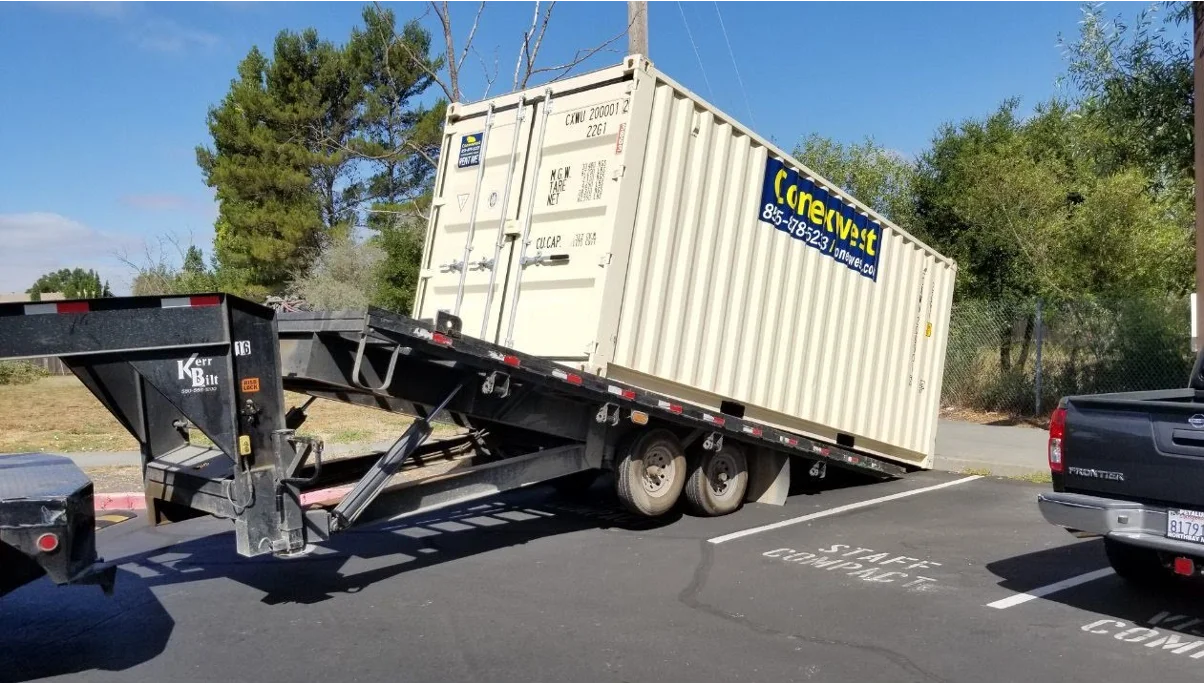 Conexwest delivering a container.