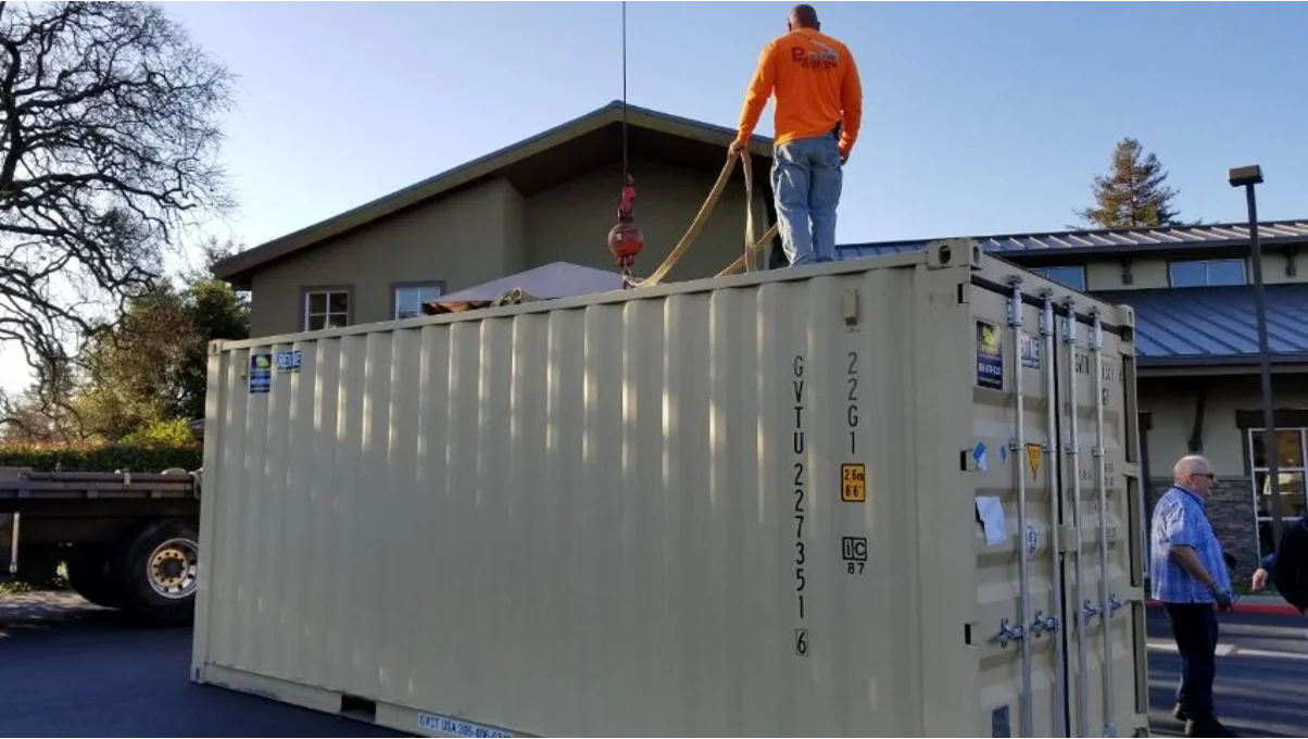 Conexwest team installing a shipping container.